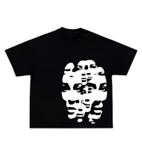 a black t - shirt with white faces on it